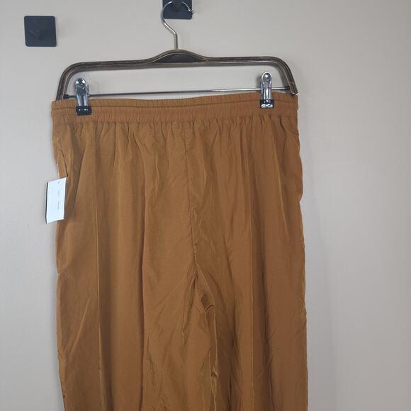 Good American Essential Nylon Track Pants in Bronze Size S - Picture 6 of 10
